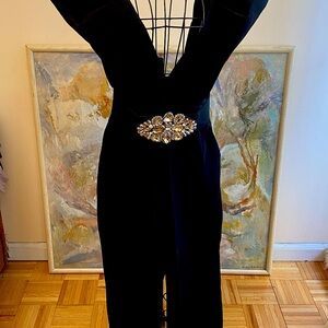 Luxurious Black Jumpsuit with Deep V-Neckline and Defined Waist